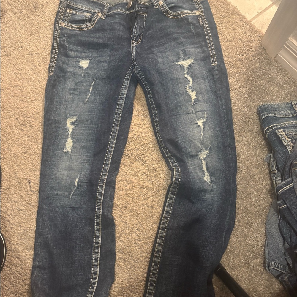 Distressed Blue Jeans